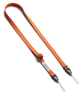 Shoulder Slim Strap - An adjustable orange nylon shoulder strap with black plastic connectors and thin attachment loops.