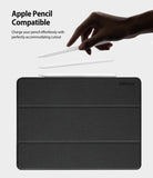 Smart Cover Apple Pencil Stand | iPad - A black textured smart case with a white stylus resting on top, shown on a light gray background with text reading 'Apple Pencil Compatible' and a hand holding the stylus above the case.