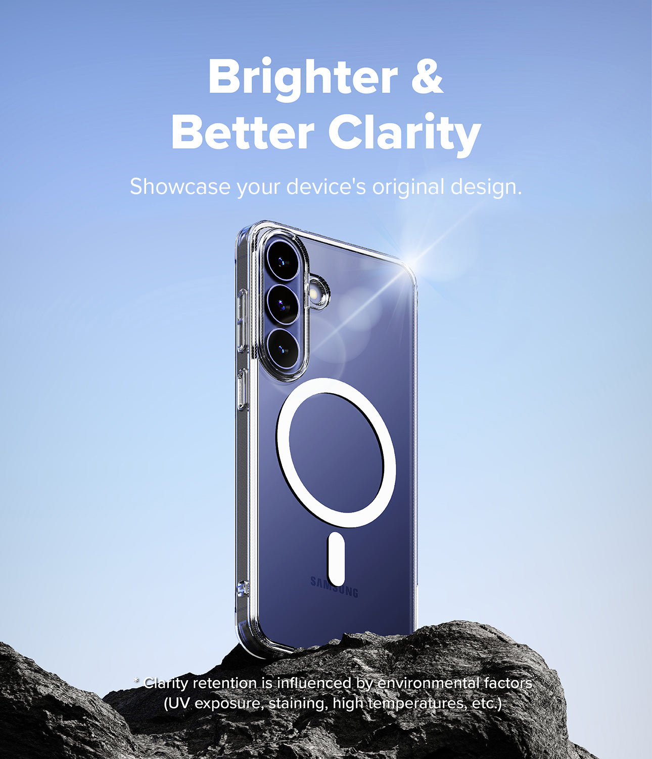 Galaxy S26 FE Case | Fusion Magnetic - A clear MagSafe-compatible phone case shown on a dark blue Samsung smartphone, standing on dark rocks against a light blue sky background. White text at the top reads 'Brighter & Better Clarity' and 'Showcase your device's original design.