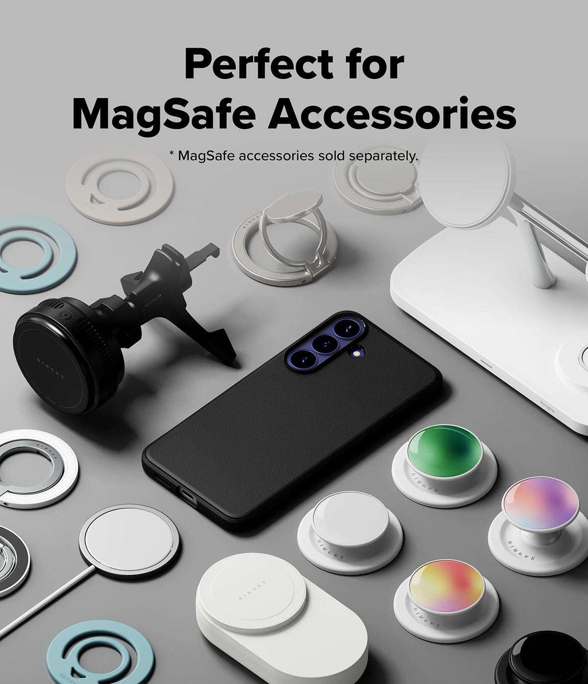 Galaxy S26 FE Case | Onyx Magnetic - A black smartphone shown with a black MagSafe-compatible ring mount and surrounded by various white and colored MagSafe accessories on a light gray background, with text reading 'Perfect for MagSafe Accessories.'.