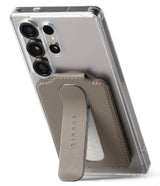 Card Holder | Slide Grip Wallet Magnetic Edge - Card Holder - Taupe magnetic card holder with a slide-out grip stand attached to the back of a clear smartphone case.