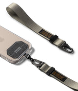 Holder Link Tactical Webbing Hand Strap - Gray tactical webbing strap with black metal carabiner attached to a phone.