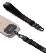 Holder Link Tactical Webbing Hand Strap - Black tactical webbing strap with metal carabiner attached to a phone case.