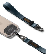 Holder Link Tactical Webbing Hand Strap - Blue tactical webbing strap with black metal carabiner attached to a phone.