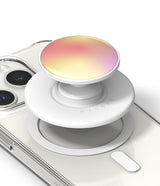 Ringke Glossy Tok Magnetic - A white magnetic phone grip with a glossy, iridescent yellow and pink gradient top on a phone.