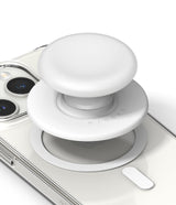 Ringke Tok Magnetic - A white circular phone grip hovering above a magnetic ring on a clear phone case.