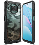 Mi 10T Lite 5G / 10i 5G Case | Fusion-X - Rugged black phone case with camo back and reinforced corners on a smartphone.
