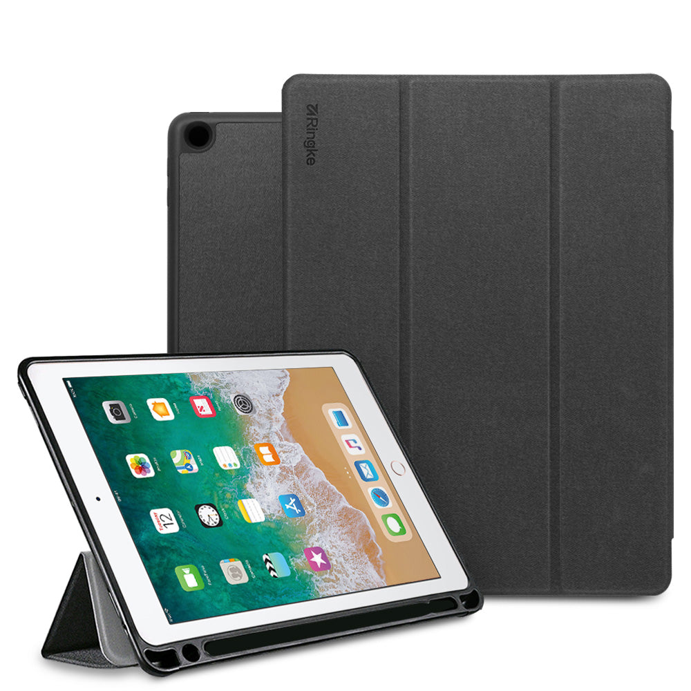 Smart Cover Apple Pencil Stand | iPad - A dark gray tri-fold tablet case shown with an iPad in front, standing in landscape orientation on its kickstand, against a plain white background.