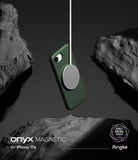 iPhone 17e Case | Onyx Magnetic - Dark green phone case suspended by a magnetic charger between textured grey rocks.