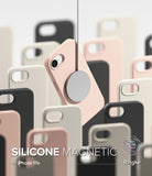 iPhone 17e Case | Silicone Magnetic - A pink magnetic phone case suspended by a charger among various colored cases.