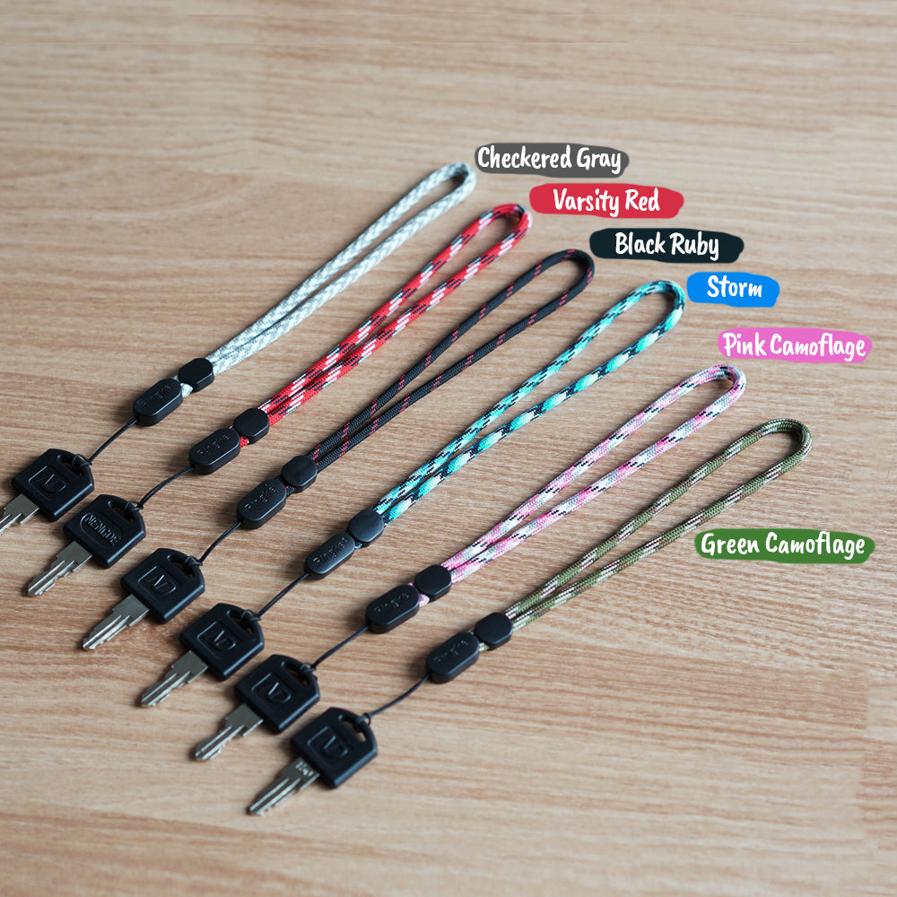 ringke paracord wrist strap available color options from checkered gray, varsity red, black ruby, storm, pink camouflage, and green camouflage